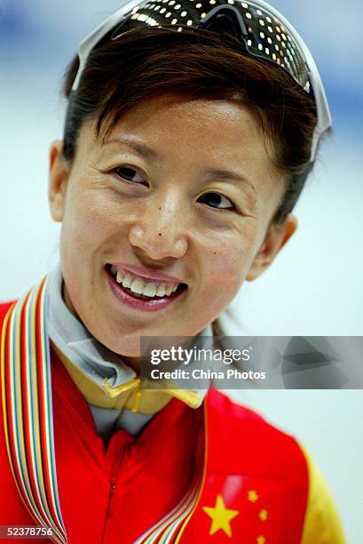 Yang Yang of China celebrates after she won the final competition of the World Short Track Speed Skating Championship Women's 500 Meter on March 12,...