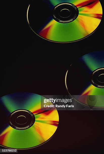 compact discs - colorful cd stock pictures, royalty-free photos & images