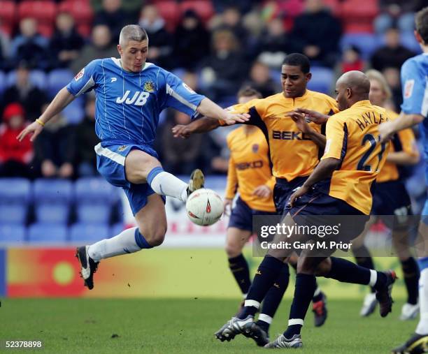 Graham Kavanagh of Wigan Athletic tries to bring the ball under control during the Coca-Cola Championship match between Wigan Athletic and Millwall...