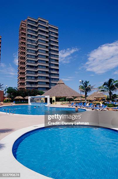 swimming pools at crown plaza hotel - hotel crown plaza stock pictures, royalty-free photos & images