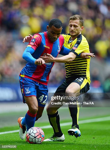 Jason Puncheon of Crystal Palace is challenged by Almen Abdi of Watford during the The Emirates FA Cup Semi Final between Crystal Palace and Watford...