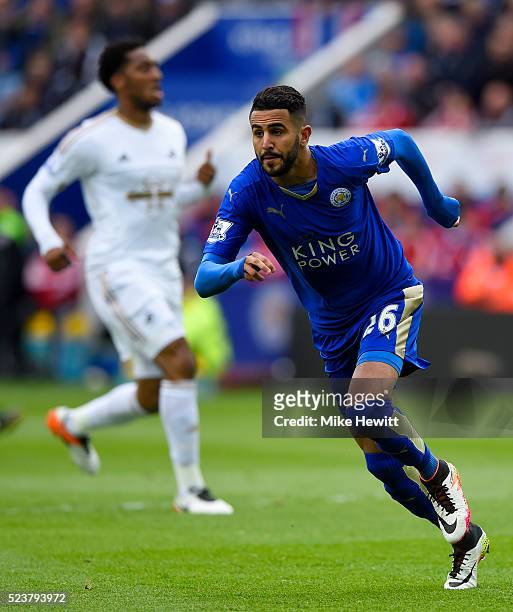 Riyad Mahrez of Leicester City celebrates as he scores their first goal during the Barclays Premier League match between Leicester City and Swansea...