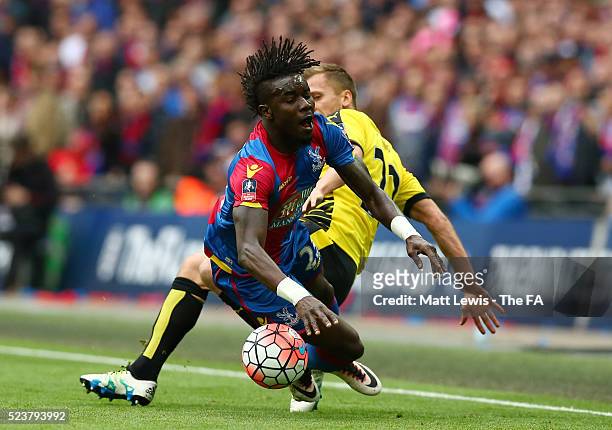 Almen Abdi of Watford challenges Pape Souare of Crystal Palace during the Emirates FA Cup Semi Final between Crystal Palace and Watford at Wembley...
