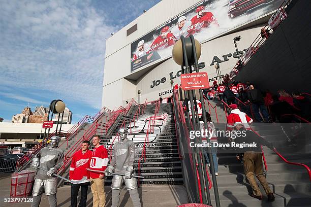 Fans pose for a picture with the Silver Anniversary guys before Game Four of the Eastern Conference First Round between the Detroit Red Wings and the...