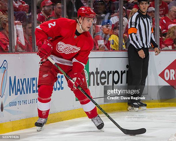 Brendan Smith of the Detroit Red Wings controls the puck behind the net against the Tampa Bay Lightning in Game Four of the Eastern Conference First...