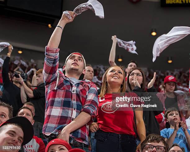 Fans cheer and twirl their towels in Game Four of the Eastern Conference First Round between the Detroit Red Wings and the Tampa Bay Lightning during...