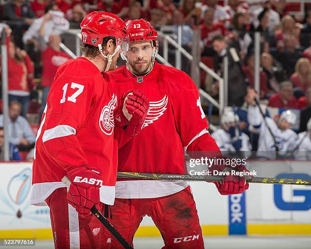 Brad Richards of the Detroit Red Wings talks with teammate Pavel Datsyuk before a face off against the Tampa Bay Lightning in Game Four of the...
