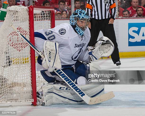 Ben Bishop of the Tampa Bay Lightning follows the play against the Detroit Red Wings in Game Four of the Eastern Conference First Round during the...