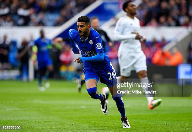 Riyad Mahrez of Leicester City celebrates as he scores their first goal during the Barclays Premier League match between Leicester City and Swansea...