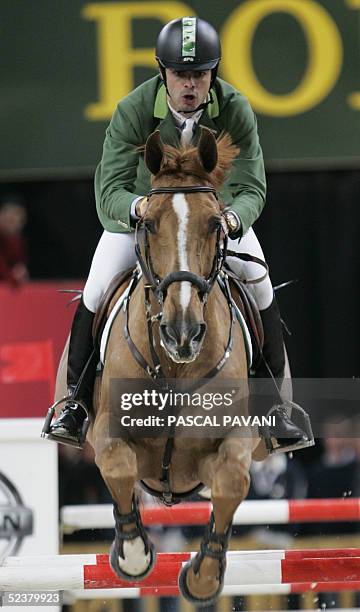 Brazilian Rodrigo Pessoa on Baloubet du Rouet vies in the International Jumping Competition in the World Cup FEI 12 March 2005 at Palais Omnisports...