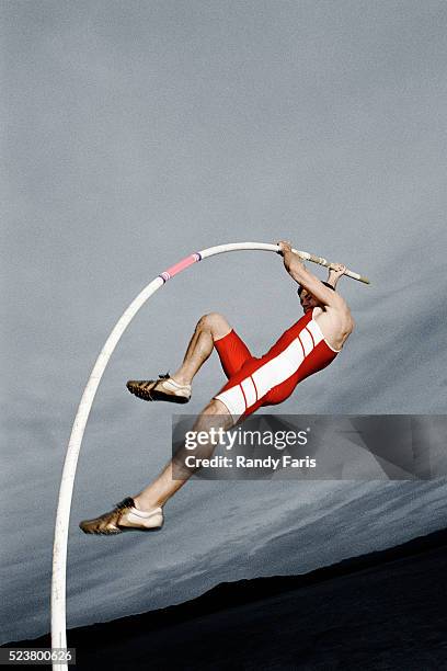 pole vaulter in midair - pole vaulter stock pictures, royalty-free photos & images