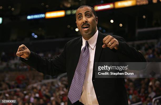 Head coach Lorenzo Romar of the Washington Huskies reacts during the 2005 Pacific Life Pac-10 Men's Basketball Tournament final game against the...