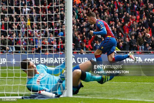 Crystal Palace's English striker Connor Wickham celebrates scoring their second goal to take the lead 2-1 during an FA Cup semi-final football match...