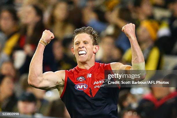 Sam Frost of the Demons celebrates after kicking a goal during the round five AFL match between the Melbourne Demons and the Richmond Tigers at the...