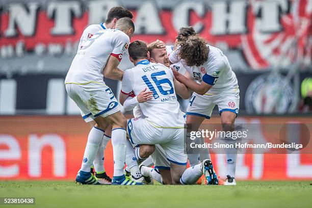 Daniel Brosinski of Mainz celebrates his team's first goal with his team mates Leon Balogun , Julian Baumgartlinger and Stefan Bell during the...