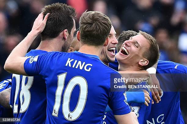Leicester City's English midfielder Marc Albrighton celebrates scoring their fourth goal during the English Premier League football match between...