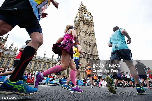 Runners pass Big Ben during the Virgin Money London Marathon on April 24, 2016 in London, England.