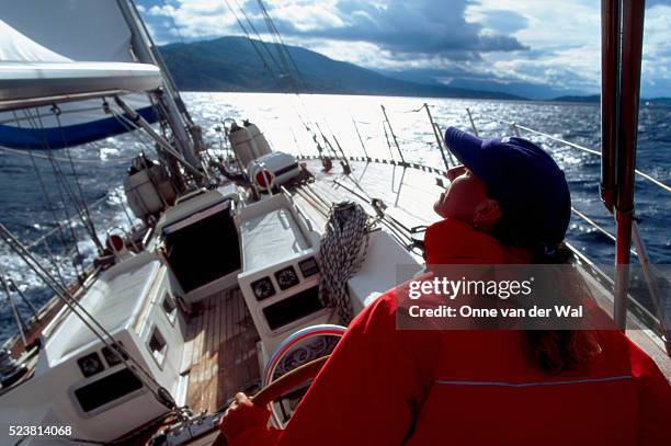 woman sailing near greece - boat helm stock pictures, royalty-free photos & images
