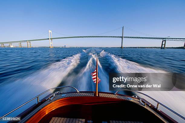 boat's stern and the newport bridge - newport rhode island stock pictures, royalty-free photos & images