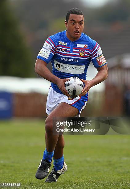 Reece Lyne of Wakefield Wildcats runs with the ball during the First Utility Super League match between Wakefield Wildcats and Hull FC at The Rapid...