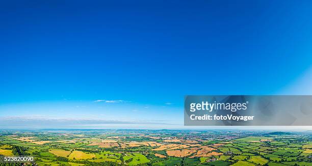aerial panorama over picturesque green summer landscape big blue skies - clear sky stock pictures, royalty-free photos & images