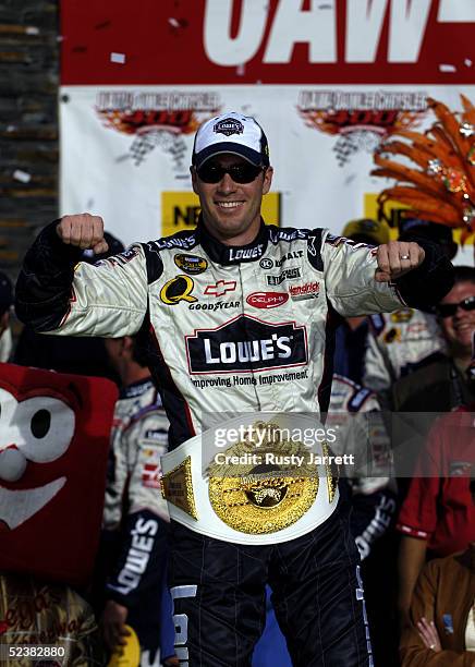 Jimmie Johnson, driver of the Hendrick Motorsports Lowe's Chevrolet celebrates winning the NASCAR Nextel Cup UAW-DaimlerChrysler 400 on March 13,...