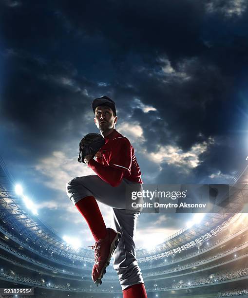 baseball pitcher on stadium - baseball pitcher stock pictures, royalty-free photos & images