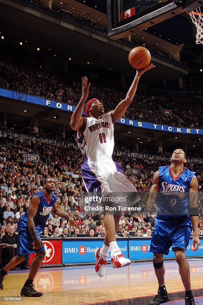 Rafer Alston of the Toronto Raptors drives baseline for the layin