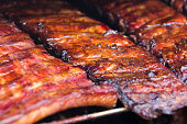 Spare ribs on grill - smoked pork ribs