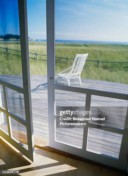 chair on deck - porta de tela imagens e fotografias de stock