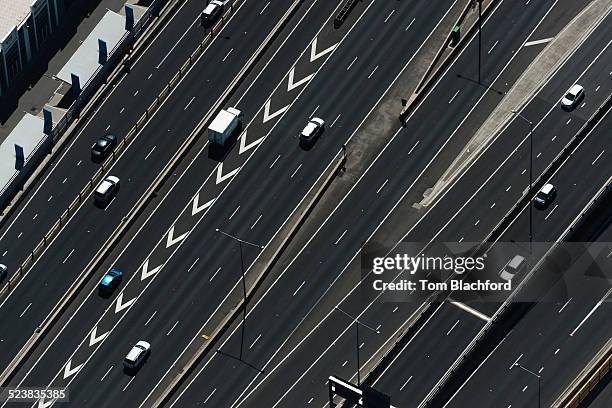 aerial view of highway and traffic, port melbourne, melbourne, victoria, australia - aerial melbourne fotografías e imágenes de stock