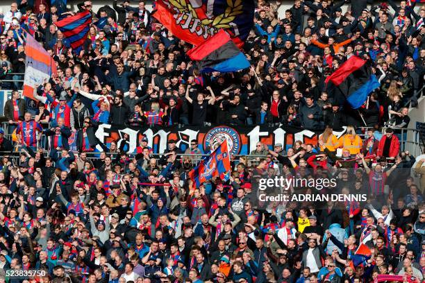 Crystal Palace fans celebrate in the crowd during an FA Cup semi-final football match between Crystal Palace and Watford at Wembley Stadium in London...