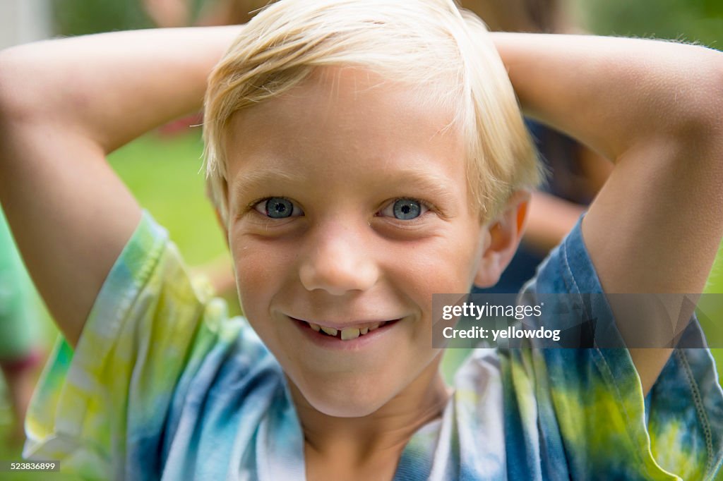 Portrait of boy in garden