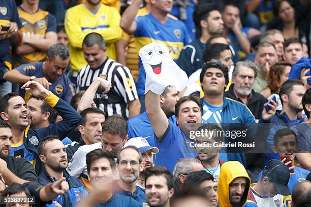 Fans of Boca Juniors cheer for their team before a match between Boca Juniors and River Plate as part of Torneo Transicion 2016 at Alberto J. Armando...