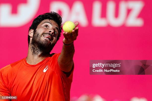 Salvatore Caruso from Italy server to Andrea Arnaboldi from Italy during their Millennium Estoril Open ATP Singles qualifying 2nd round tennis match,...