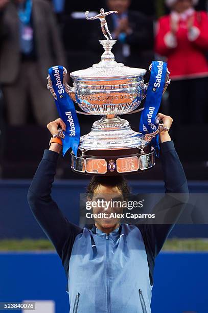 Rafael Nadal of Spain poses with the trophy after defeating Kei Nishikori of Japan in the final match during day seven of the Barcelona Open Banc...