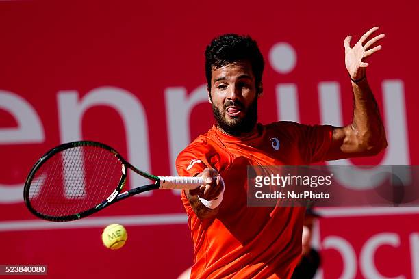 Salvatore Caruso from Italy returns a ball to Andrea Arnaboldi from Italy during their Millennium Estoril Open ATP Singles qualifying 2nd round...