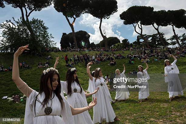 Girls dressed in white gowns take part in the annual commemorative parade during festivities marking the 2769th anniversary of the founding of Rome,...