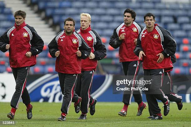 Bayer Leverkusen players warm up during a training session at Hampden Park, Glasgow. The UEFA Champions League Final will be played between Real...