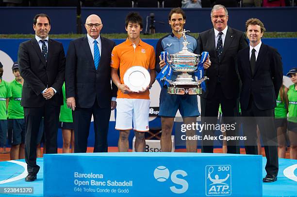 Tournament Director Albert Costa, President of Banc Sabadell Josep Oliu, Kei Nishikori of Japan, Rafael Nadal of Spain, President of Real Club de...