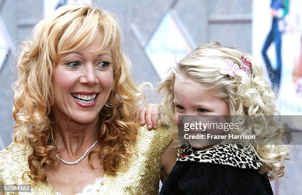 Actress Lynn Holly Johnson and daughter Jensie arrive at the Walt Disney premiere of "The Ice Princess" at the El Capitan Theatre on March 13, 2005...
