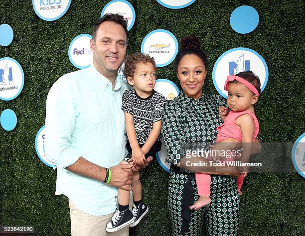 Journalist Adam Housley, Aden John Tanner Housley, actress Tamera Mowry-Housley, and Ariah Talea Housley attend Safe Kids Day at Smashbox Studios on...