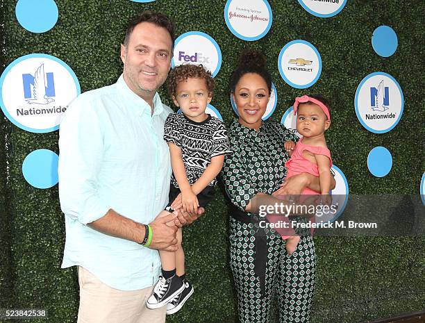 Journalist Adam Housley, Aden John Tanner Housley, actress Tamera Mowry-Housley, and Ariah Talea Housley attend Safe Kids Day at Smashbox Studios on...