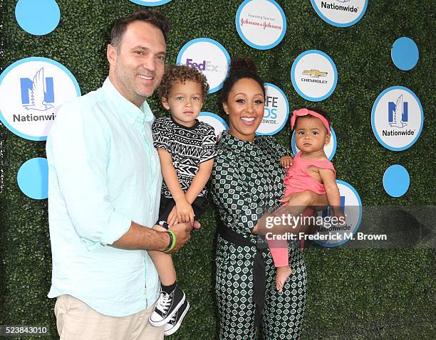 Journalist Adam Housley, Aden John Tanner Housley, actress Tamera Mowry-Housley, and Ariah Talea Housley attend Safe Kids Day at Smashbox Studios on...