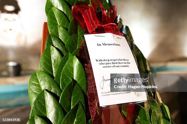 Note from Governor-General Sir Jerry Mateparae is pinned to a wreath during Dawn Service at Pukeahu National War Memorial Park on April 25, 2016 in...