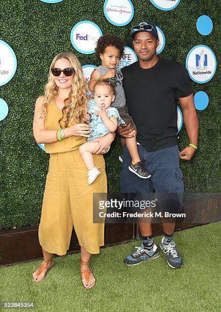 Actor Donald Faison , CaCee Cobb and children attend Safe Kids Day at Smashbox Studios on April 24, 2016 in Culver City, California.