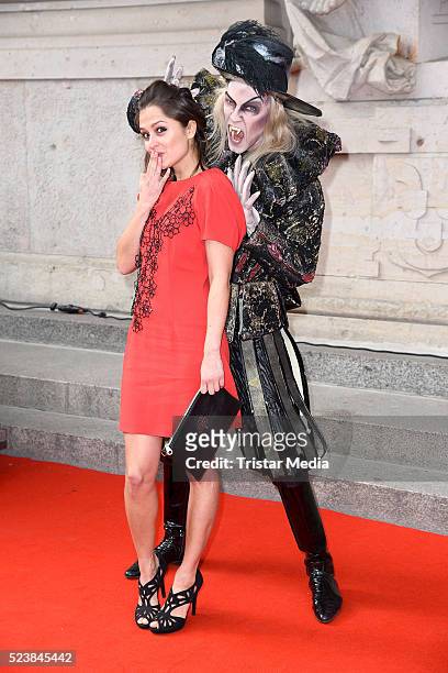 Sarah Alles with a vampire figure attend the 'Tanz der Vampire' Musical Premiere on April 24, 2016 in Berlin, Germany.