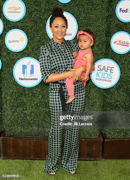 Actress Tamera Mowry-Housley and Ariah Talea Housley attend Safe Kids Day at Smashbox Studios on April 24, 2016 in Culver City, California.