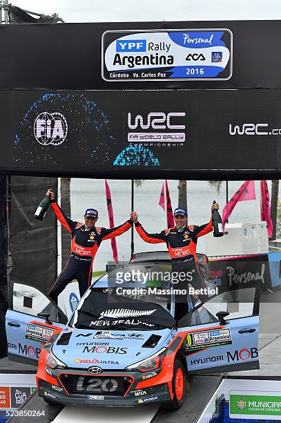Hayden Paddon of New Zealand and John Kennard of New Zealand celebrate their victory during Day Three of the WRC Argentina on April 24, 2016 in Villa...