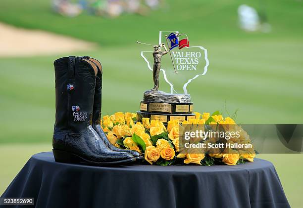 The Valero Texas Open trophy and the cowboy boots are seen during the final round of the Valero Texas Open at TPC San Antonio AT&T Oaks Course on...